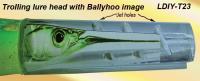 Osprey trolling lure with a ballyhoo head inlay within the trolling head